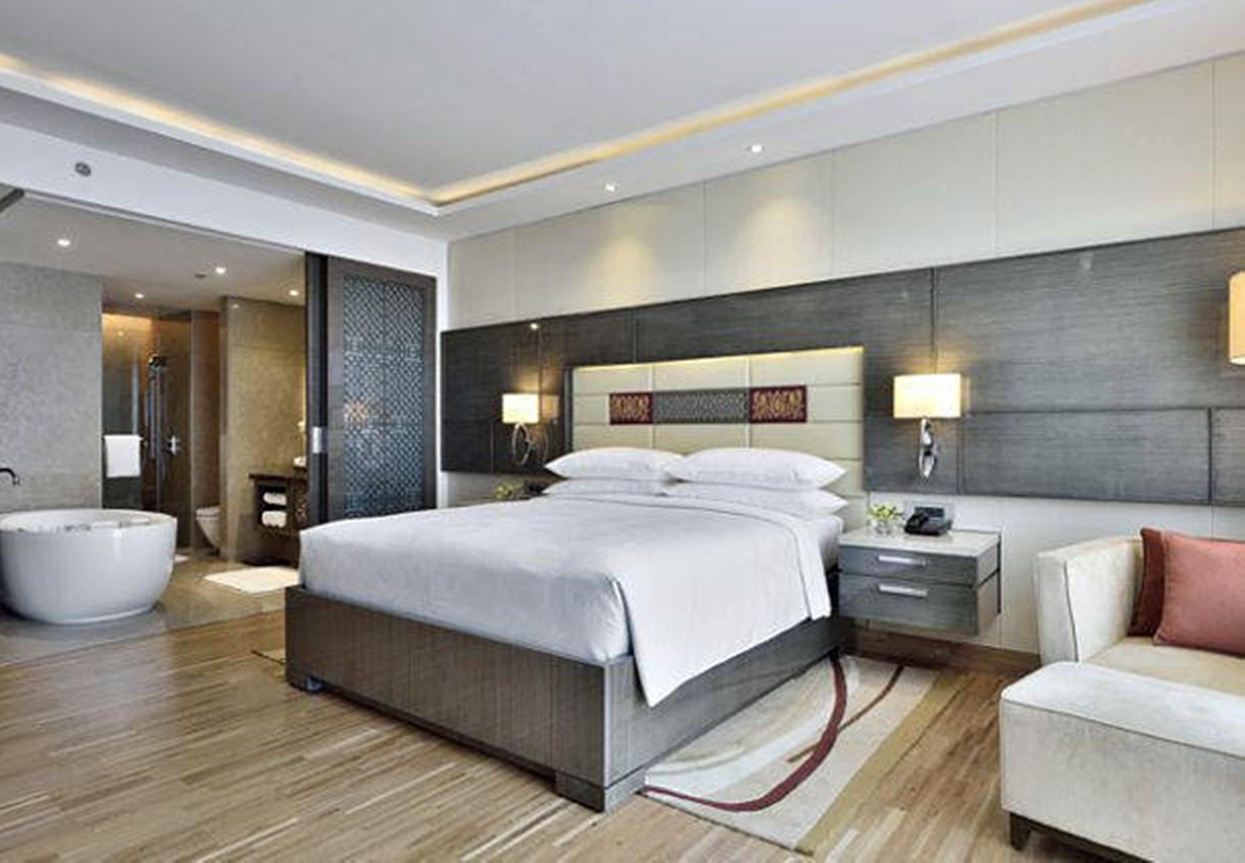 Hotel Jw Marriott Mumbai Sahar Airport Exteriér fotografie A bedroom at the hotel