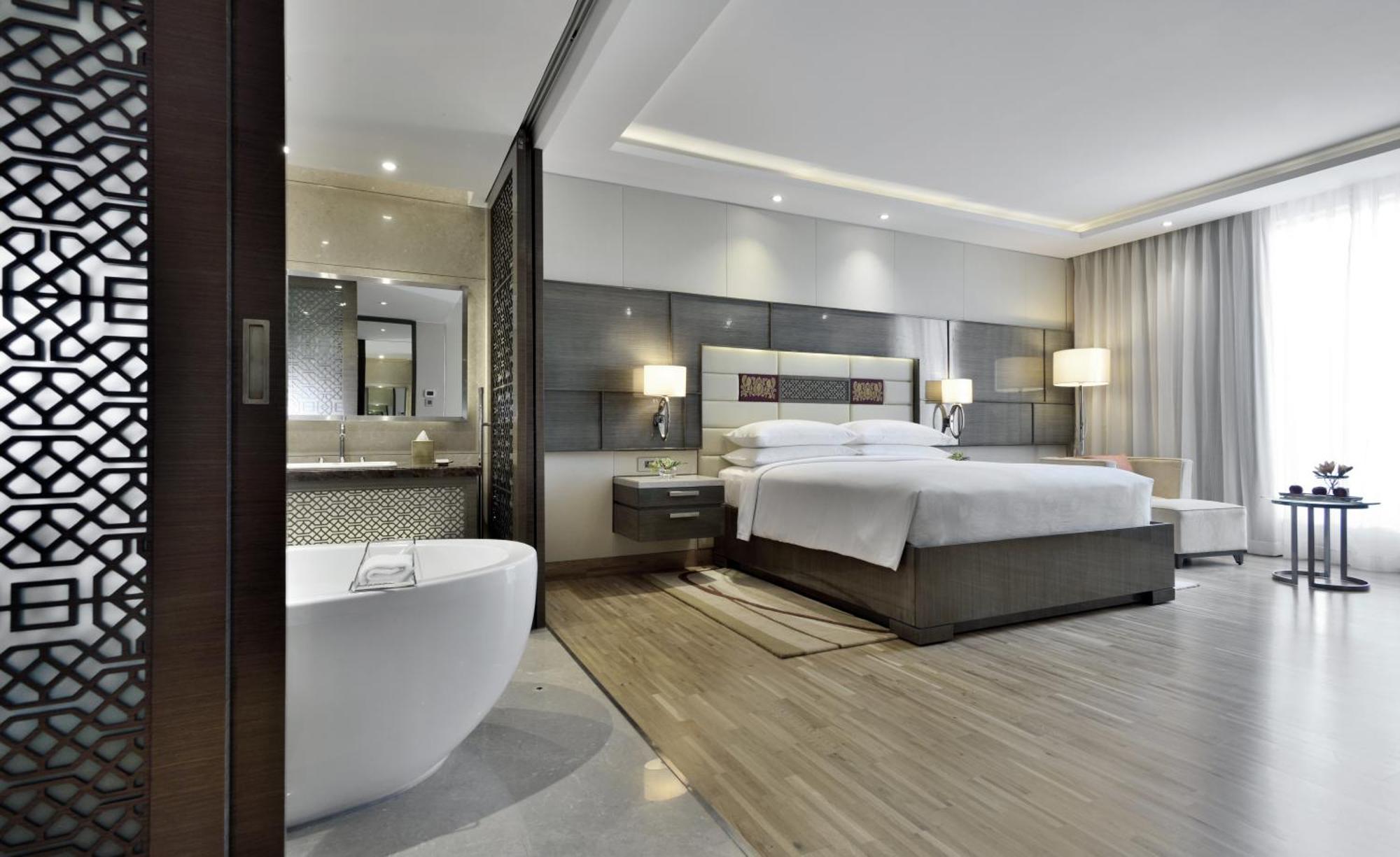 Hotel Jw Marriott Mumbai Sahar Airport Exteriér fotografie A bedroom at the hotel